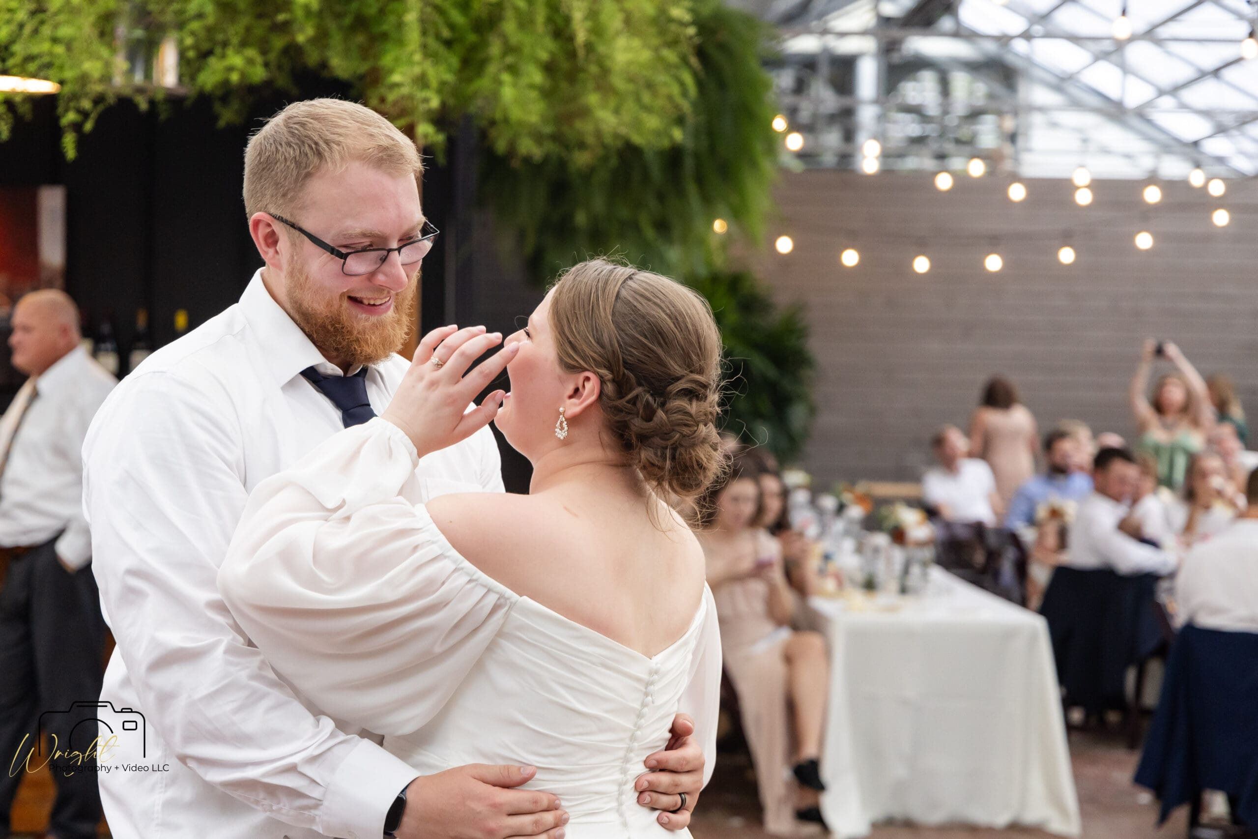 Gage and Emily dancing together at their reception