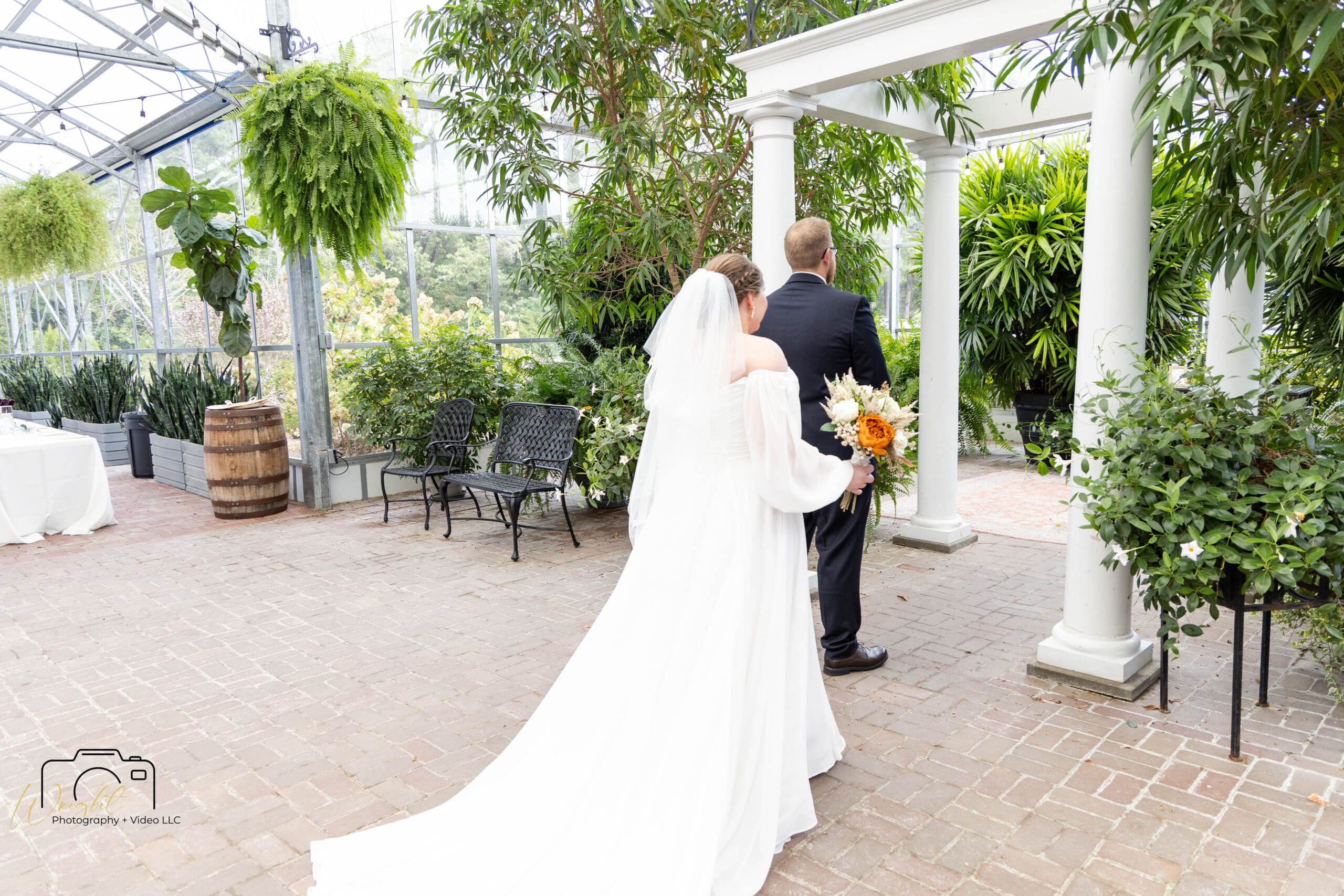 Emily walking down the aisle toward Gage