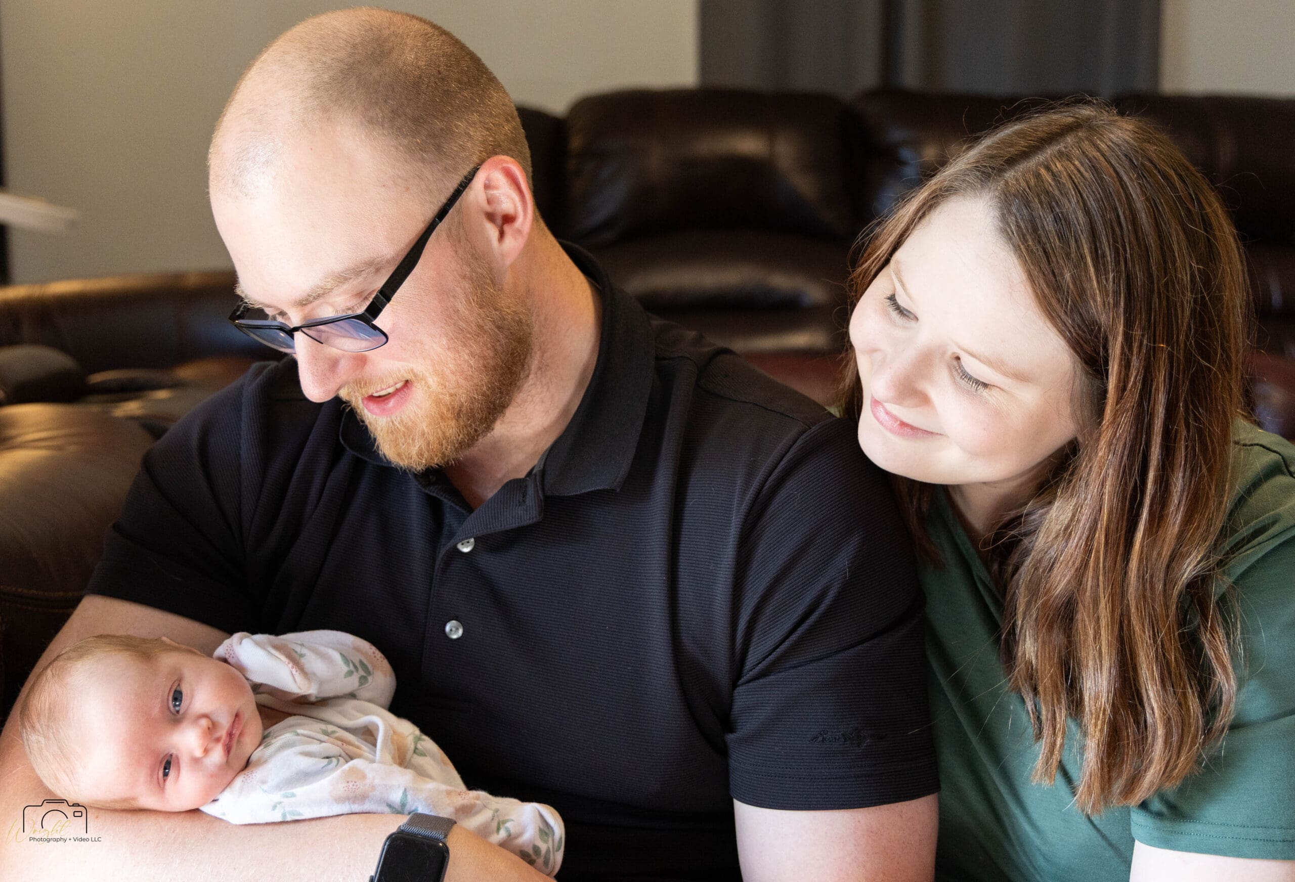 Gage and Emily gazing at Amelia together