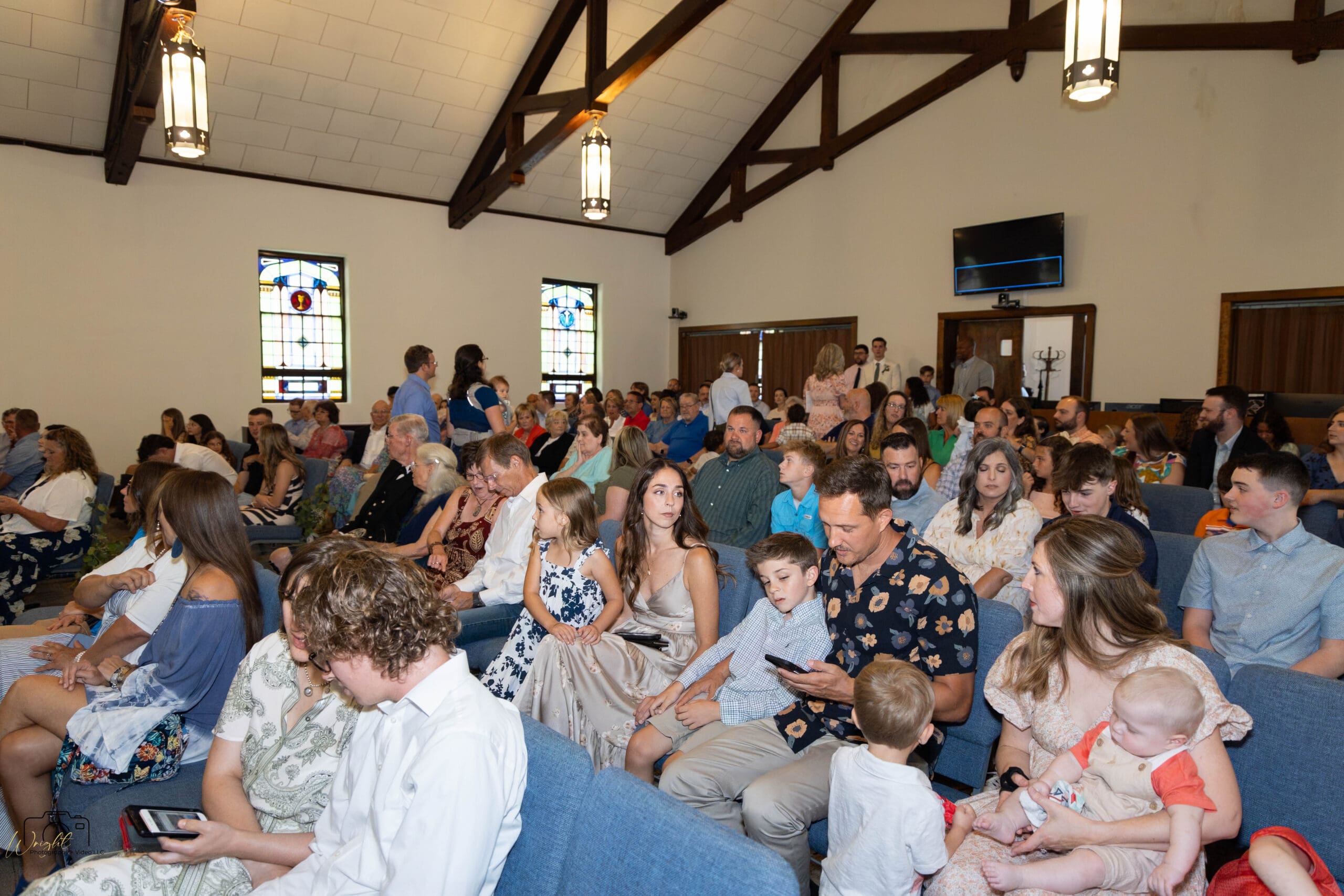 Guests filling the pews at Friendship Baptist Church before the ceremony