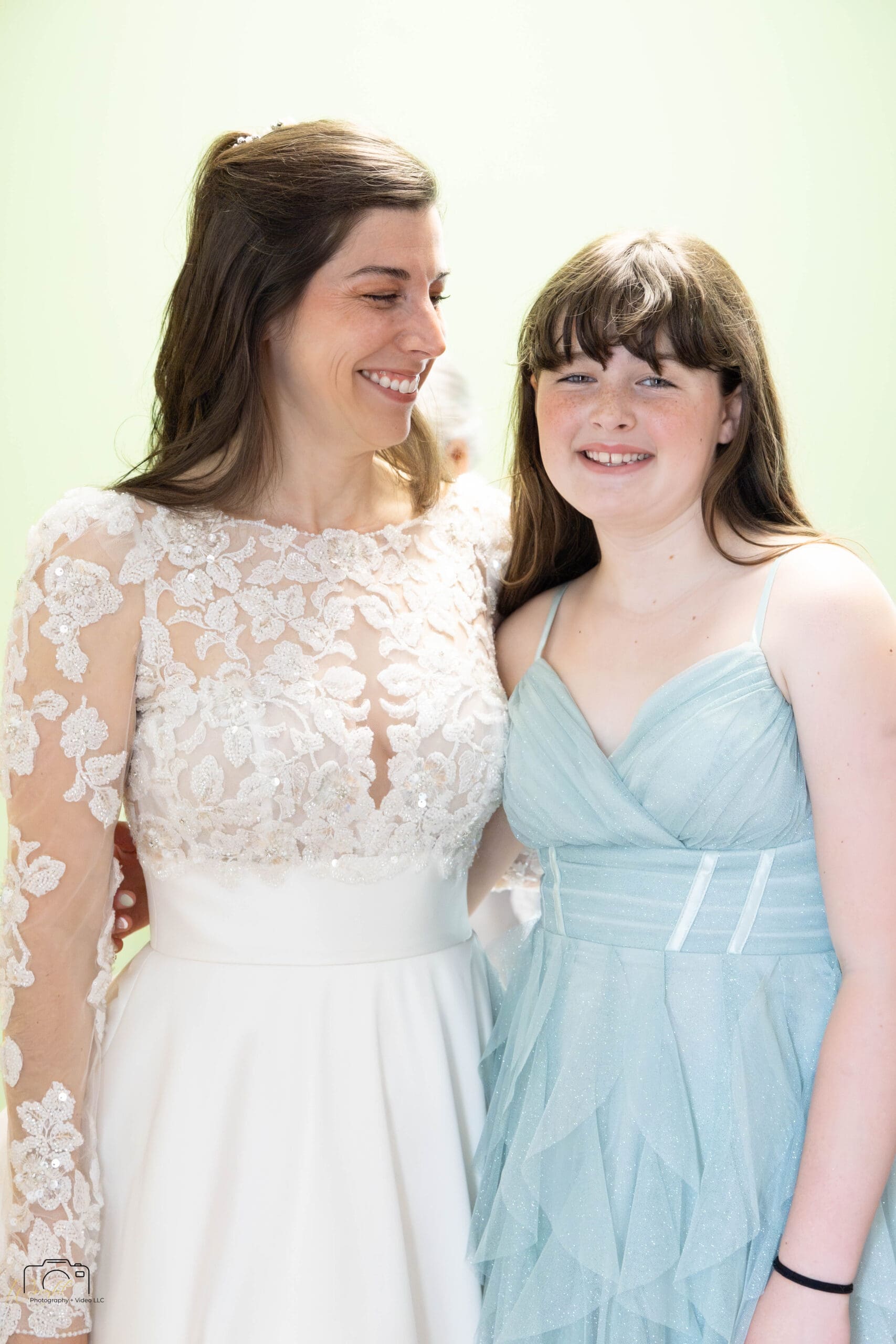 Elizabeth with her bridesmaids showing the array of green dress shades
