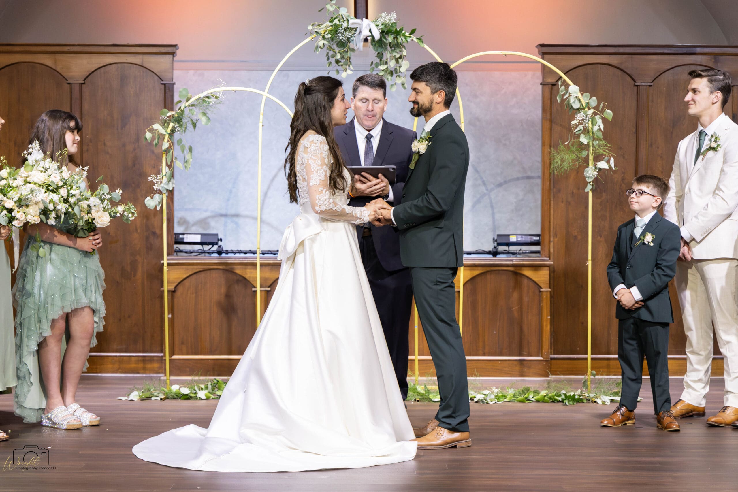 Ryan placing the ring on Elizabeth's hand