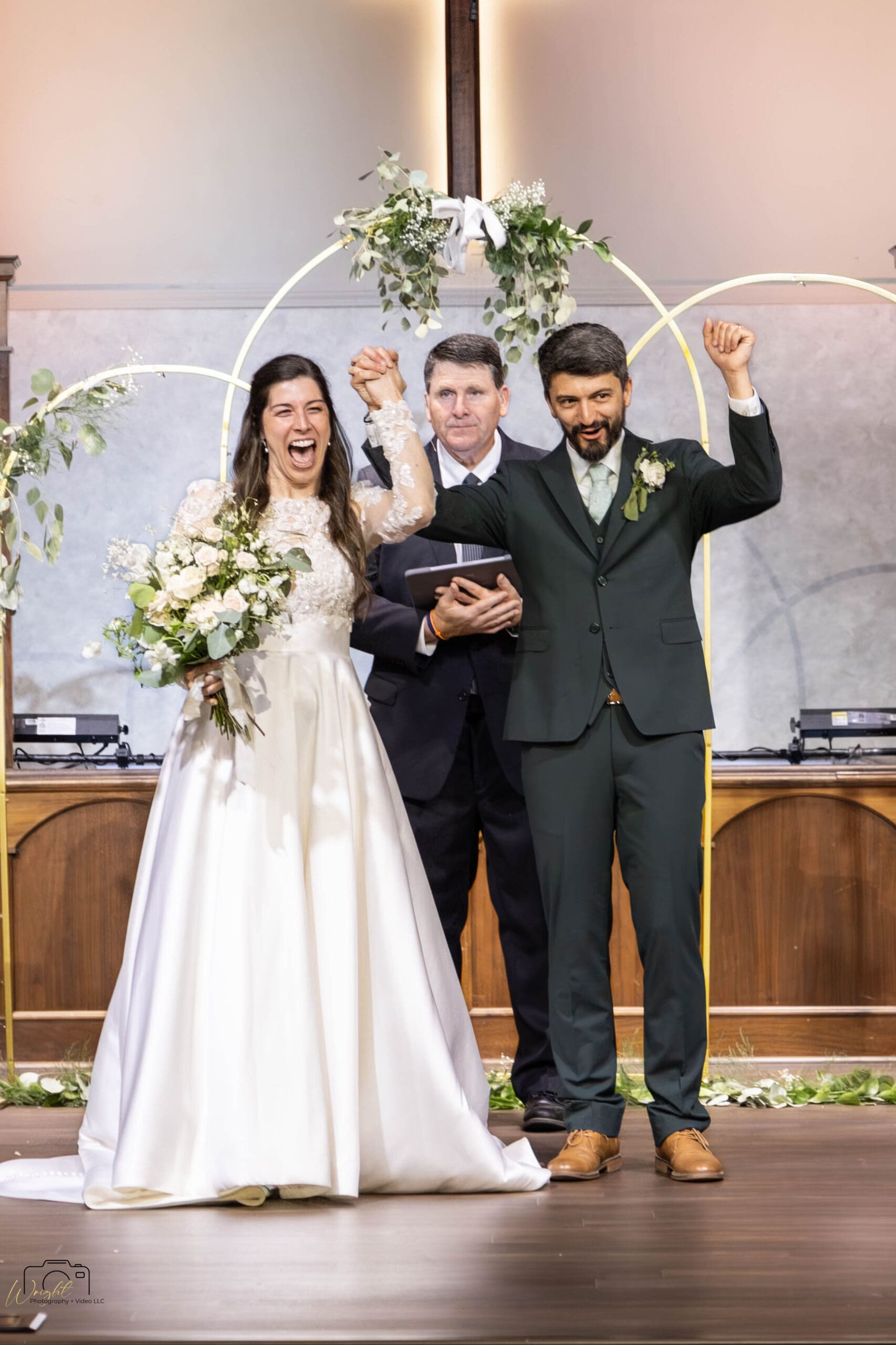 Ryan and Elizabeth celebrating as husband and wife at The Purple Toad Winery