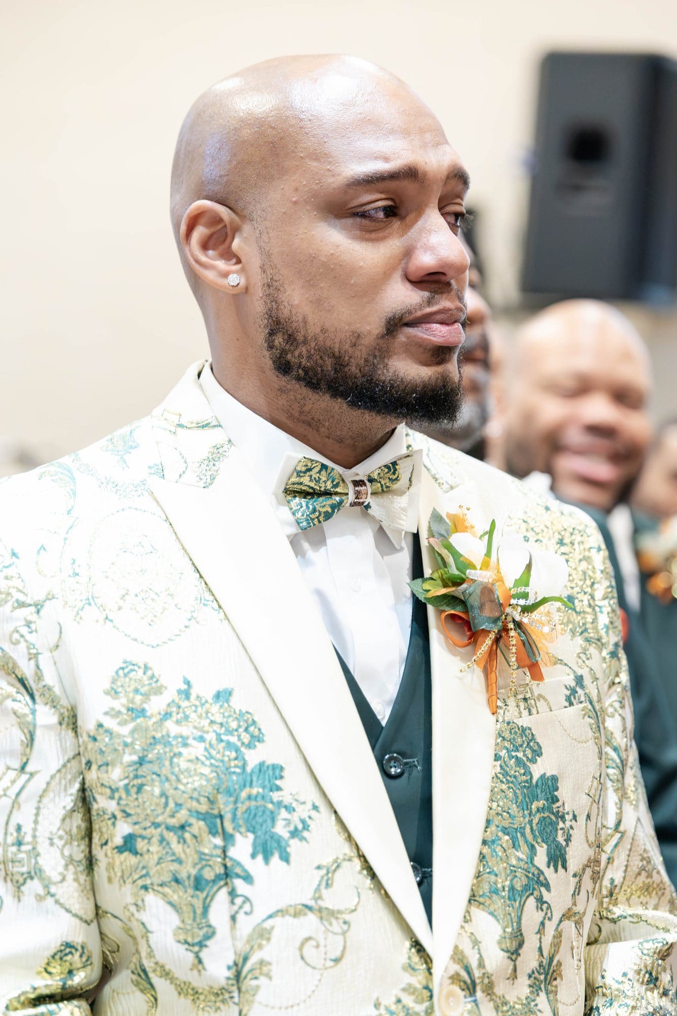 David with tears forming as he sees Nikeesha walk down the aisle
