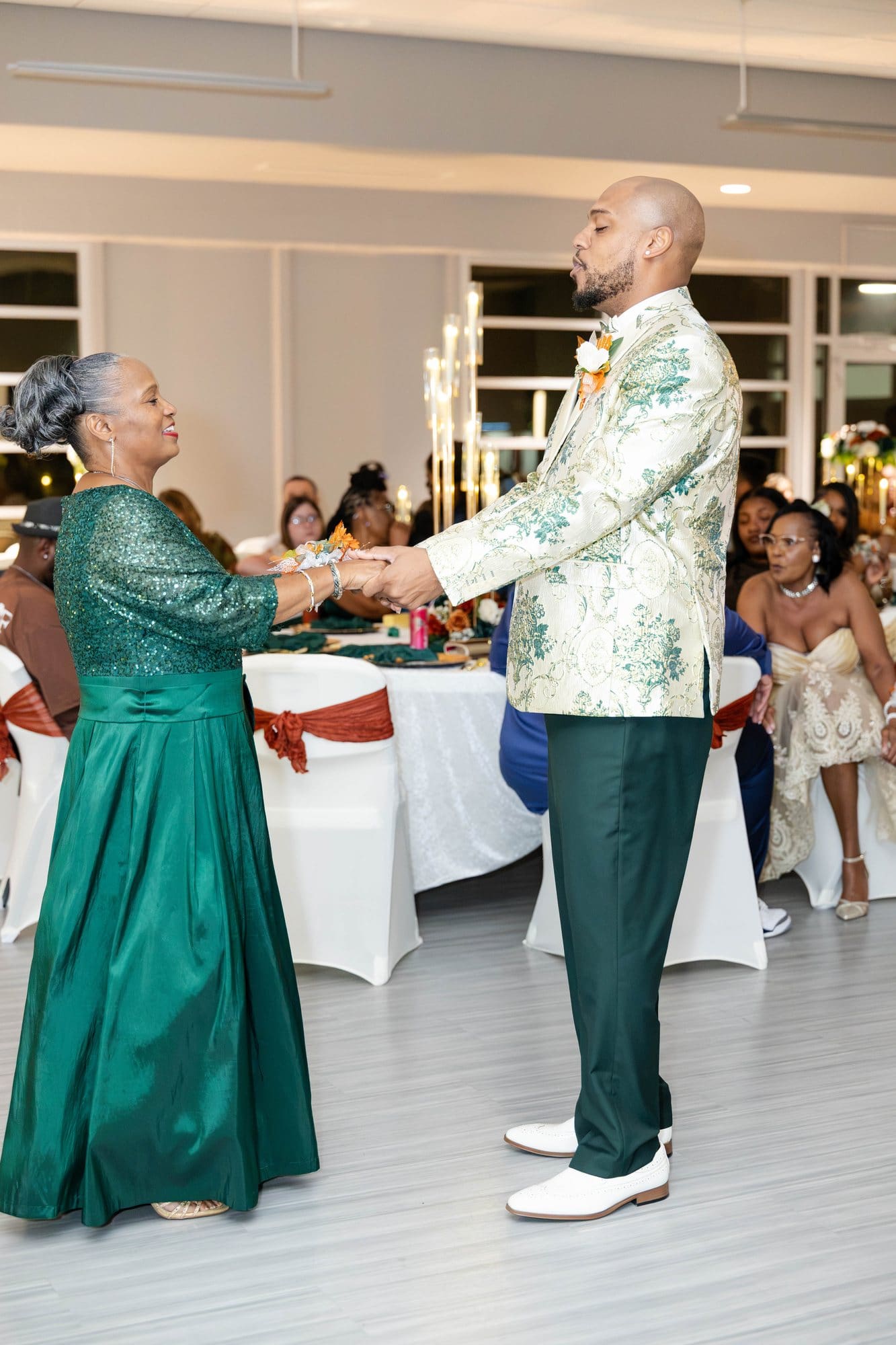 David and his mother dancing together on the reception dance floor