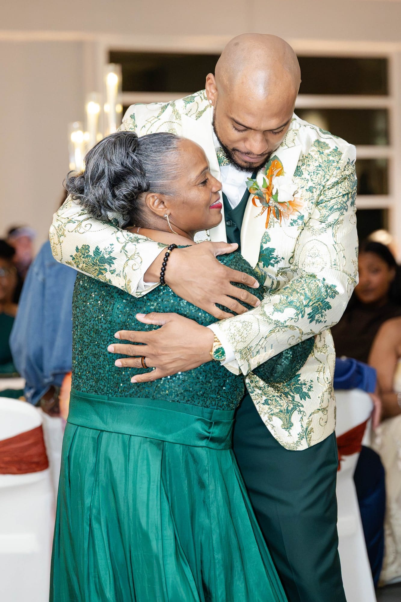 David embracing his mother at the end of their dance